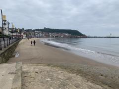 Setting out along the beach at Scarborough